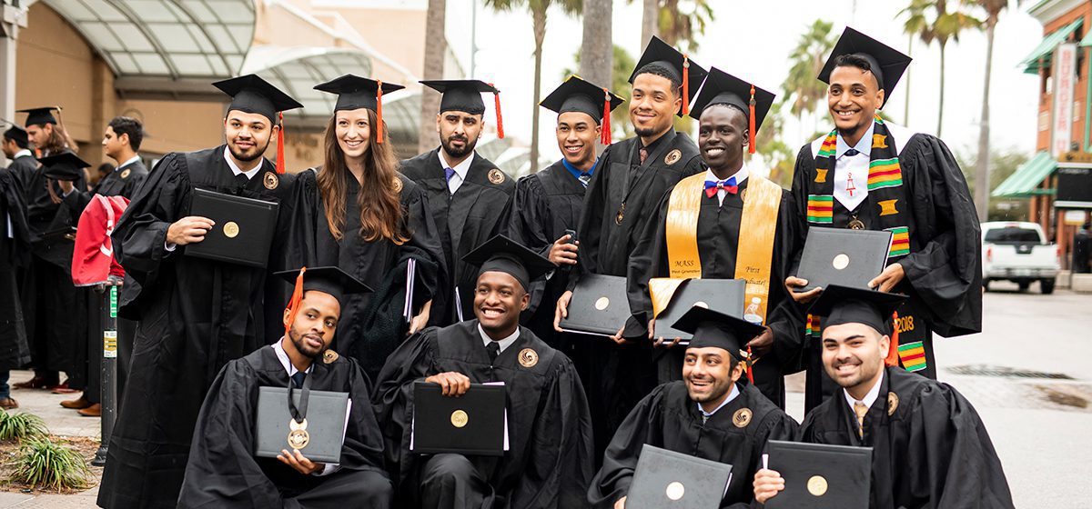 Graduates standing together Group photo of UCF graduates
